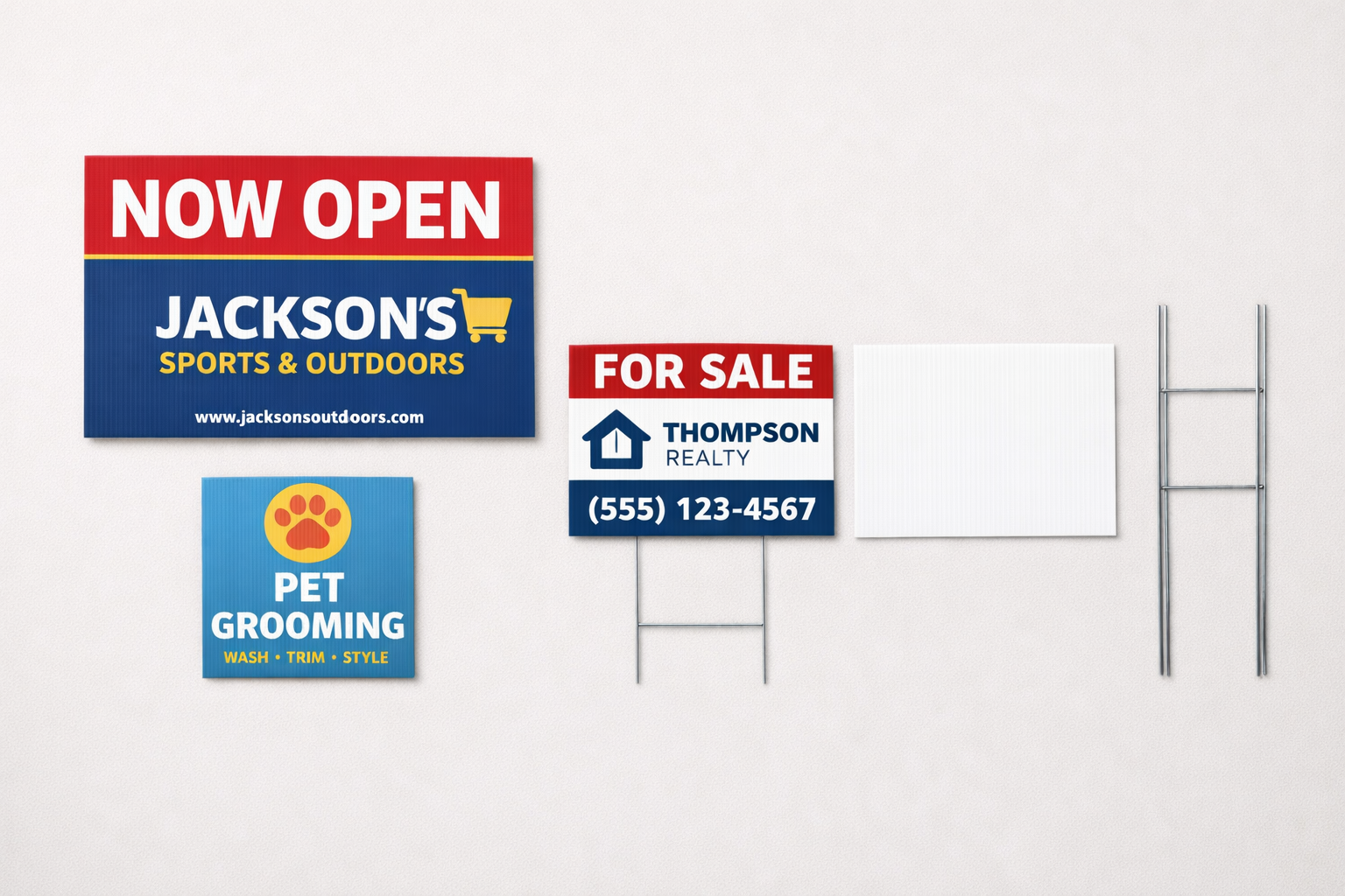 Four custom yard sign mockups in different sizes and designs displayed on a gray background