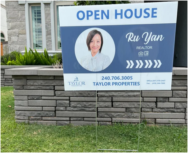 white and blue yard sign example