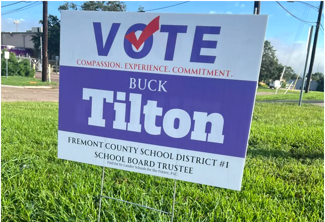 a schoolboard trustee political yard sign