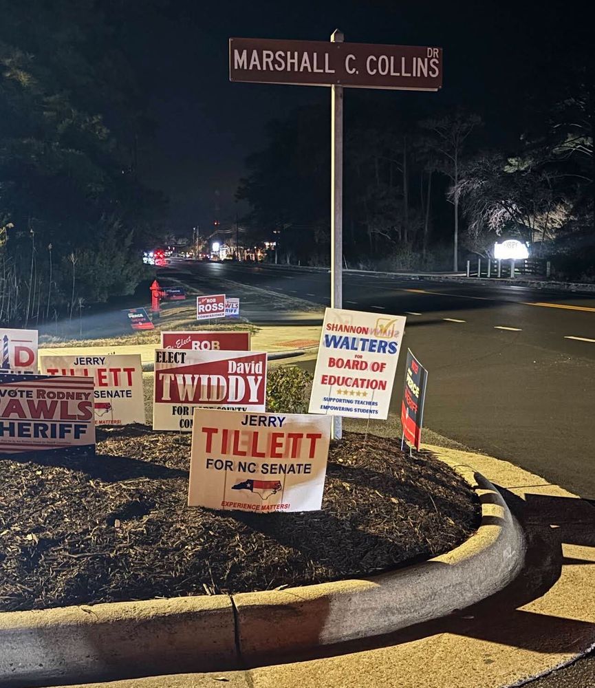 customer photos of yard sign plus