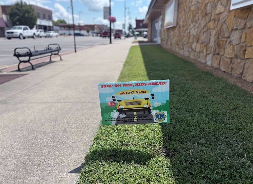 customer photos of yard sign plus