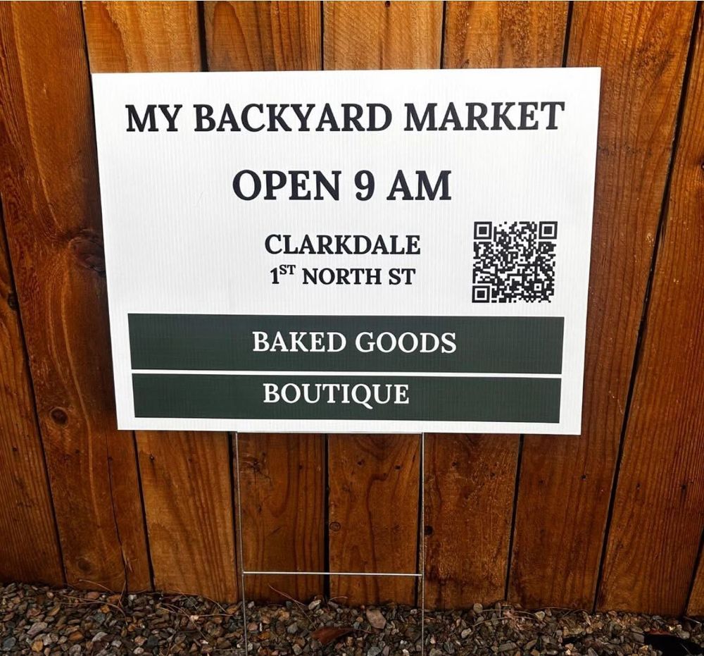 customer photos of yard sign plus