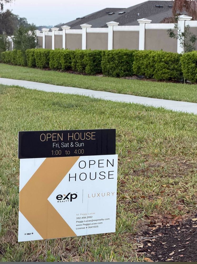 customer photos of yard sign plus