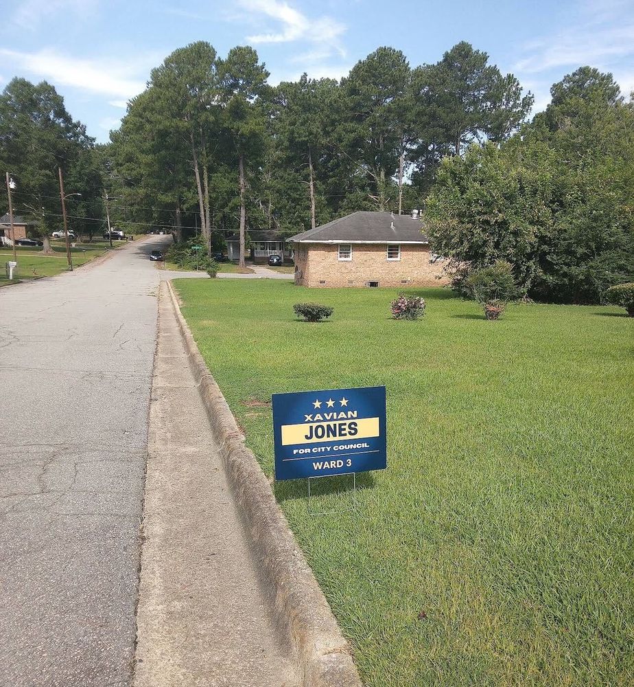customer photos of yard sign plus