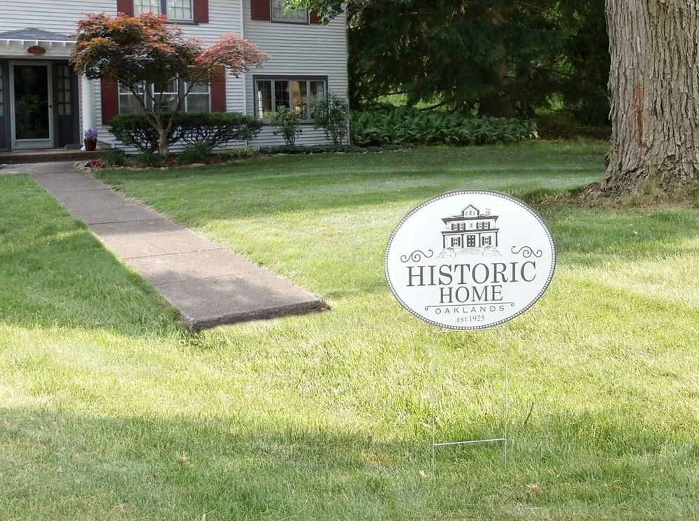 customer photos of yard sign plus