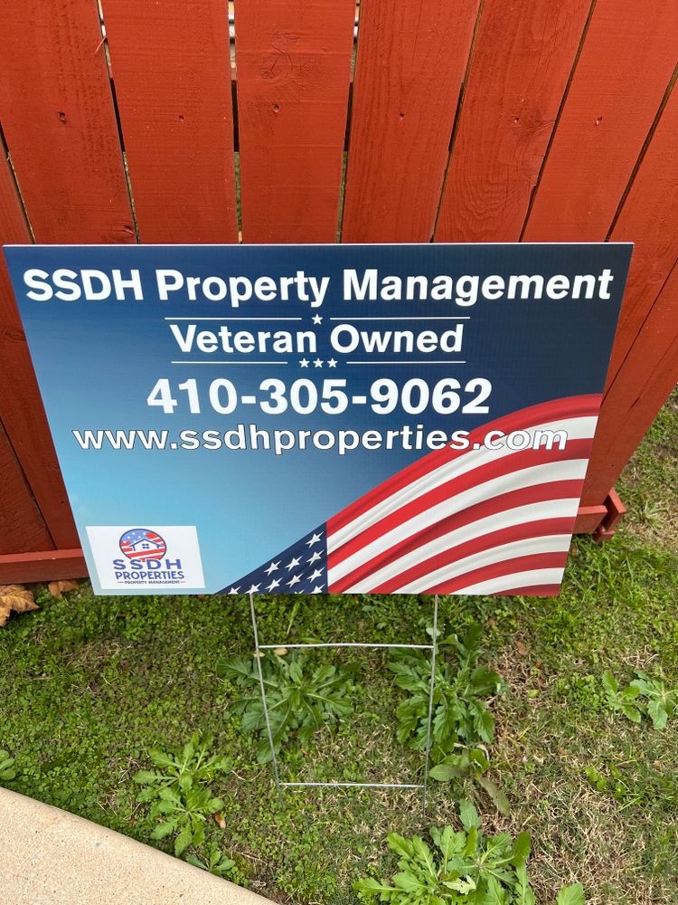 customer photos of yard sign plus