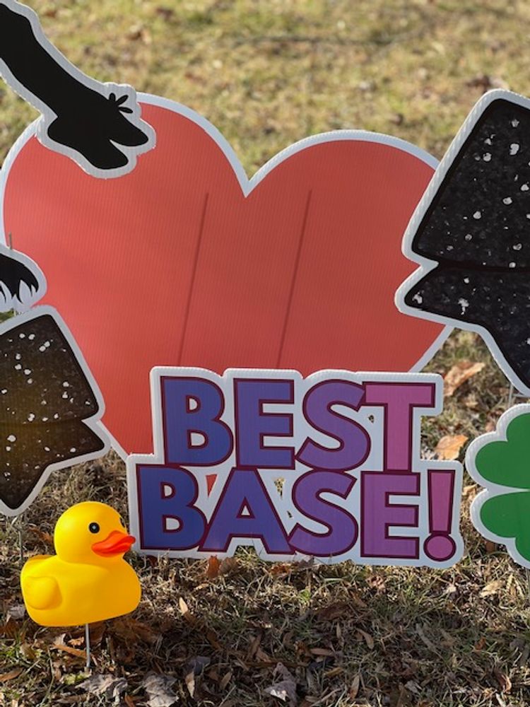 customer photos of yard sign plus