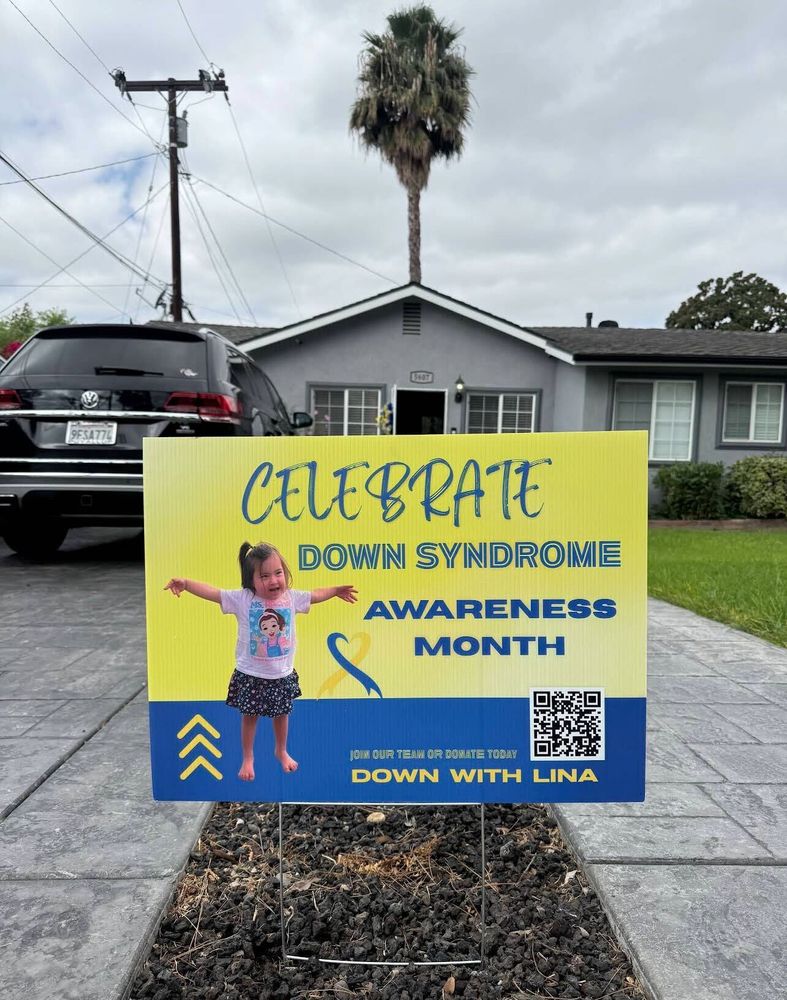 customer photos of yard sign plus