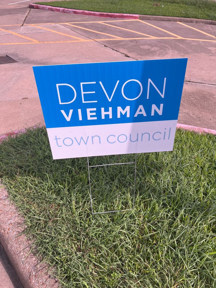 customer photos of yard sign plus