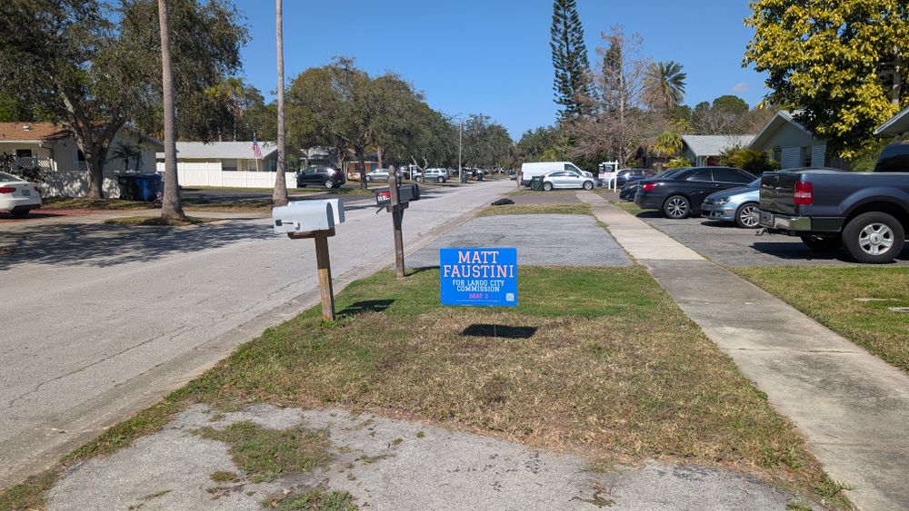 customer photos of yard sign plus