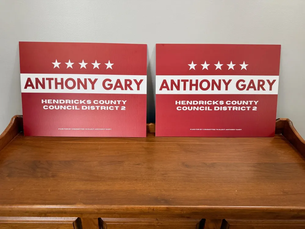 customer photos of yard sign plus