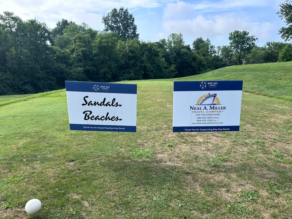 customer photos of yard sign plus